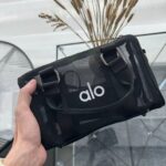 Mini perforated hand-held mesh bag, single-shoulder and cross-shoulder dual-purpose mesh zipper phone case, wear-resistant
