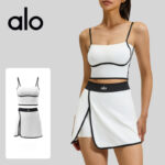 Color-blocked linear sports vest, slit short skirt set, women's fitness fixed cup