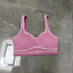 AL0 nude feel gathering sports bra, color-blocked peach butt high-waisted yoga pants, color-blocked sports yoga set