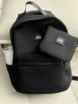 alo's same style waterproof backpack, matte neoprene rubber, black tight fabric, face mother, travel bag