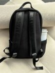 alo's same style waterproof backpack, matte neoprene rubber, black tight fabric, face mother, travel bag