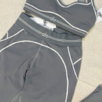 AL0 nude feel gathering sports bra, color-blocked peach butt high-waisted yoga pants, color-blocked sports yoga set